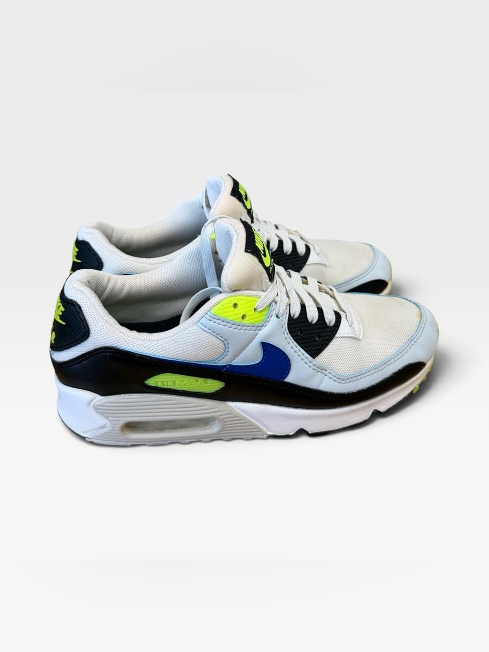 Nike White/Blue/Black Athletic Sneakers with Neon Yellow Accents